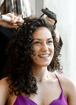 hairdresser in facial protection curling the hair 2025 01 09 01 50 28 utc Luxury Hair Treatments Hackettstown